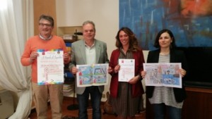 nella foto da sinistra: Paolo Fissi, vice-preside, il sindaco Lorenzini, Valentina Elena Ballerini e l'assessore alla pubblica istruzione De Masi con alcuni dei fumetti prodotti dai bambini